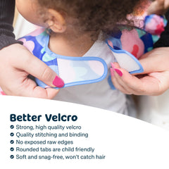 Tiny Twinkle bib worn by child at mealtime demonstrating flexible coverage.