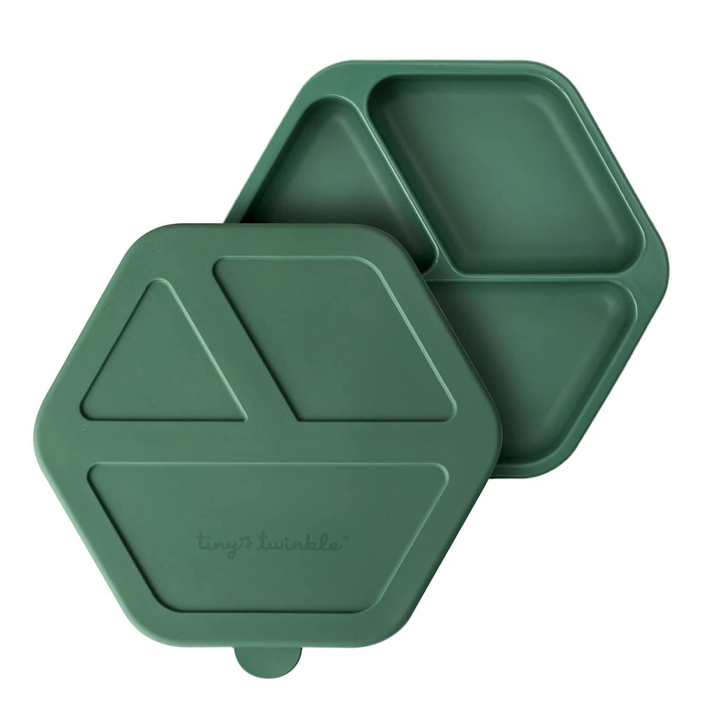 Tiny Twinkle silicone suction plate on a highchair tray showing strong grip for mess-free meals