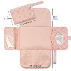 Tiny Twinkle portable changing pad open with wipes pocket enables quick one-handed diaper changes.