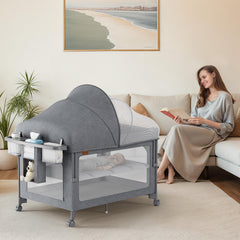 TinyGlow bedside crib sleeper with mosquito net for close nighttime care