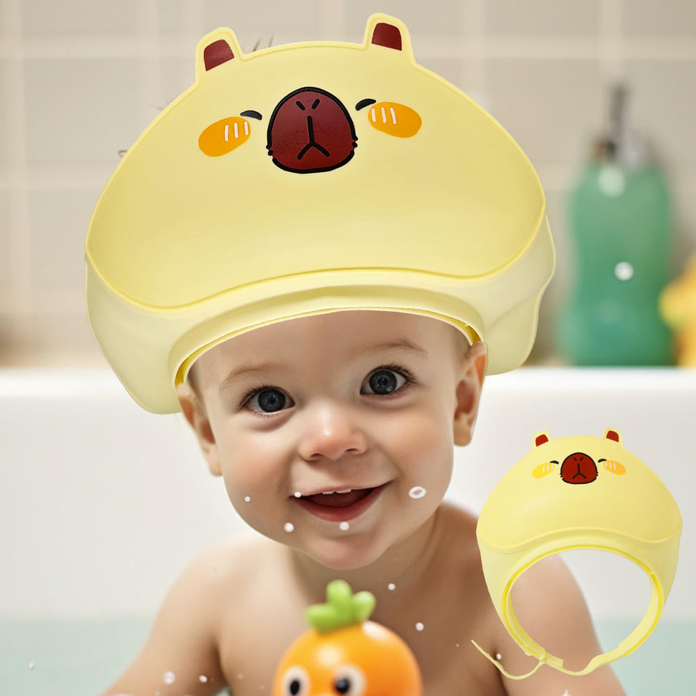 TinyGuardian baby shower cap yellow front view keeps water and shampoo foam away from eyes.
