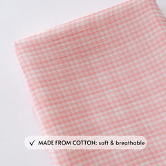 TISU Gingham pink-gingham cover with elastic bands for secure pad fit.