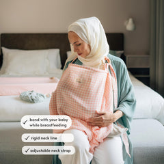 TISU nursing cover showing rigid-neckline and adjustable-strap for eye contact.