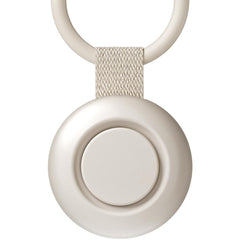 TKGOU portable sound machine clipped on a stroller for on-the-go soothing