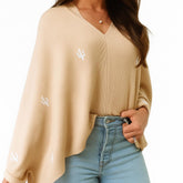 Toci Mom stylish nursing cover poncho in breathable fabric provides discreet nursing privacy on the go.