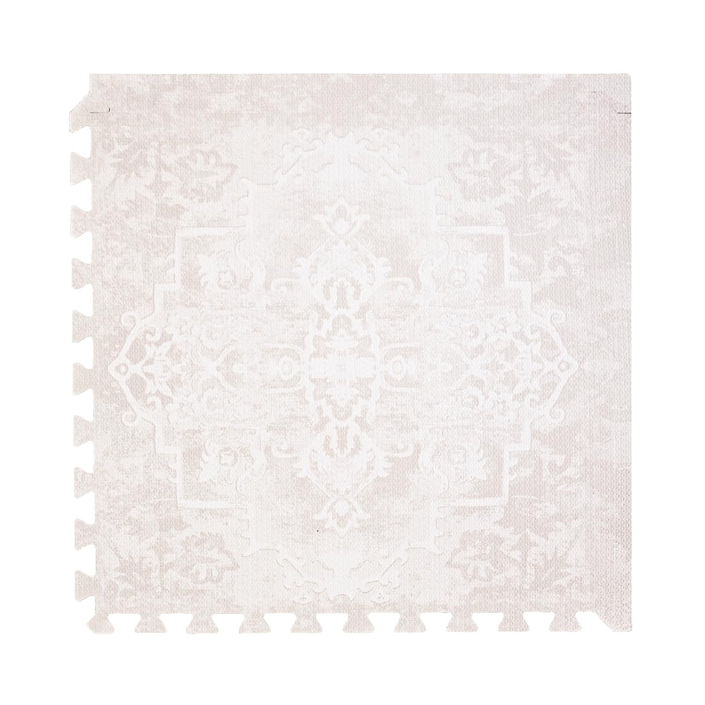Toddlekind playmat off-white tile closeup shows soft, cushioned surface for safe tummy time.