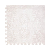 Toddlekind playmat off-white tile closeup shows soft, cushioned surface for safe tummy time.