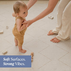 Toddlekind Playmat off-white with modern rug look blending into living rooms.