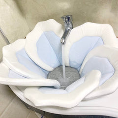 TOFOAN Baby Bath Pad blue flower petal close-up shows secure seat for newborns