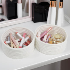 Togous nursery basket sits by crib for safe, soft storage.