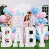 Tongjoy BABY marquee letters glow softly on a baby shower backdrop