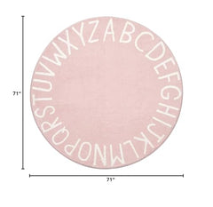 Topotdor nursery area rug with alphabet design adds color to kids pink bedroom.