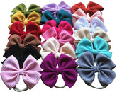 Toptim baby-bow headband made of soft nylon for comfortable, non-slip wear.