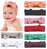 Toptim baby headbands with cotton-knotted rabbit ears, gentle on delicate skin, perfect for newborn photos.