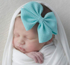 Toptim big-bow headband 4.7x4 inch for adjustable, stylish newborn looks.