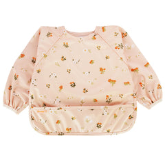 Torange waterproof long sleeve bib with catch pocket traps spills during a messy BLW meal.