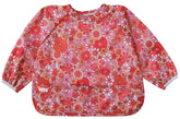 Torange waterproof long-sleeve bib wearing during dinner keeps spills contained for stress-free meals.