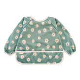 Torange bib fabric close-up shows easy-clean, non-toxic material for busy mealtimes.