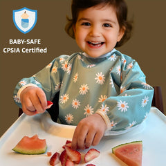 Torange bib pocket front highlights spill capture during meals.