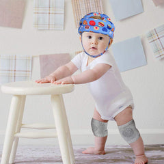 TORASO baby helmet head-protection close-up showing cushioned shell for gentle protection.