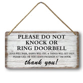 tosles baby sleeping sign on front door keeps naps peaceful.