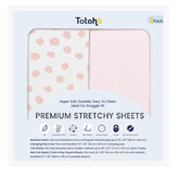 TotAha Premium Stretchy Crib Sheets closeup fabric shows silky texture for baby's comfort.