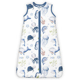 TotBASIC 1.0 Tog sleep sack worn by toddler in ocean animals print for safe sleep.