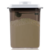 Tourdeus Formula Container to Go with lid open for quick one-handed access.