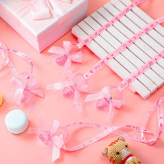 TrelaCo pacifier necklaces its-a-girl text pairs with pink theme for gender reveal events.