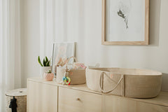 Trendy Baby Changing Basket waterproof pad detail emphasizes easy wipe-clean comfort.