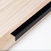 Trimold aluminum peel-and-stick L-molding corner guard with 90-degree angle protects walls from dings and scuffs.