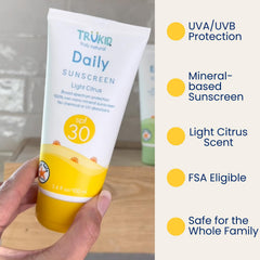 TruKid sunscreen face-body application shows lightweight, non-greasy coverage for outdoor play.