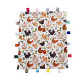 TRYTUTRY tag blanket showcases colorful tags for tactile exploration and soothing comfort.