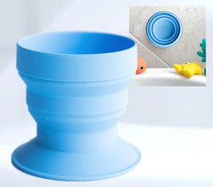 Tubby Cup collapsible bath rinse cup demonstrates space-saving design for tub.
