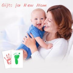 Tubuui inkless handprint kit features a clear baby hand imprint.