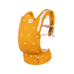 Free to Grow front carry by Tula shows ergonomic knee-to-knee support for growing babies.