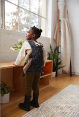Tula Baby Mini Toy Carrier in soft cotton fabric offers gentle, cozy playtime comfort.