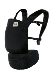 Tula Lite compact carrier packed in waistband for on-the-go storage and quick use.
