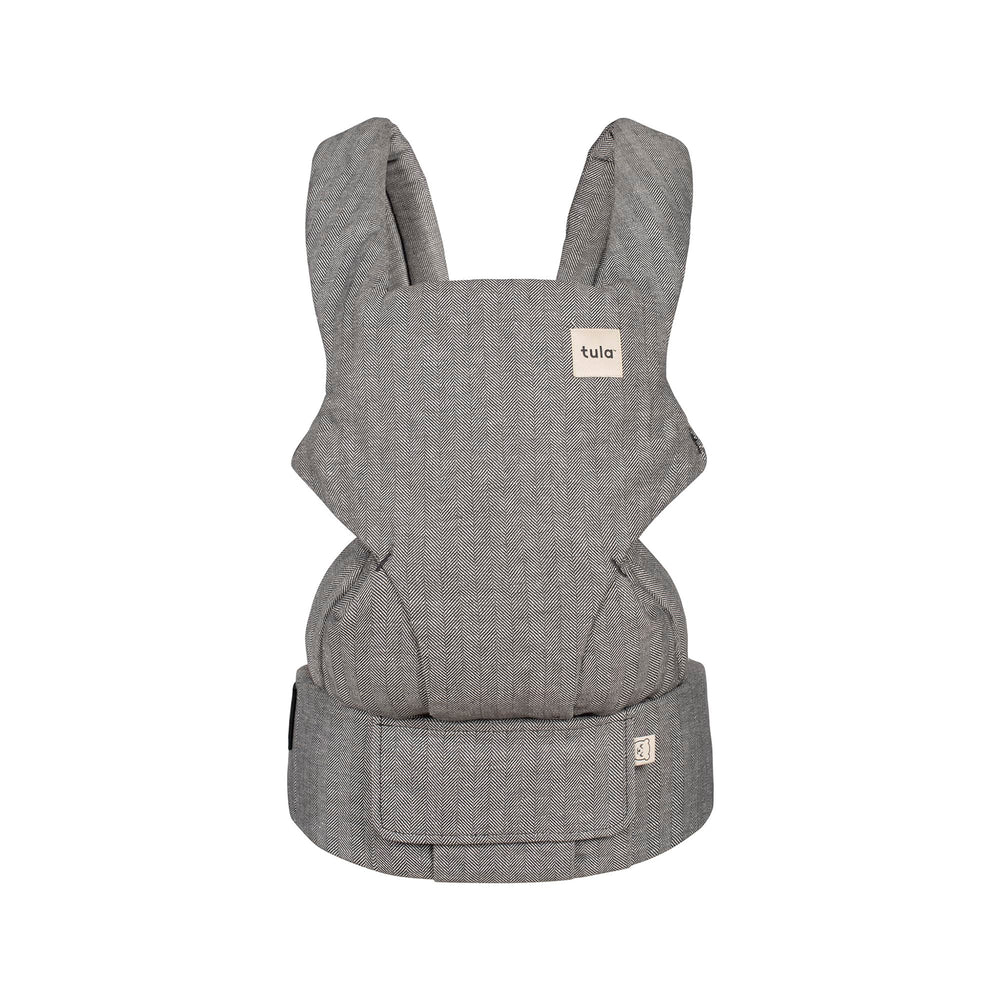 Tula Explore carrier in ash linen for front carry provides ergonomic support on the go.