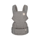 Tula Explore carrier in ash linen for front carry provides ergonomic support on the go.