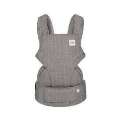 Tula Explore carrier in ash linen for front carry provides ergonomic support on the go.