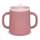 TUM TUM pink 3-way trainer cup front view with stable base for mess-free feeding.
