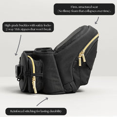 TushBaby hip-seat carrier with baby in carrier demonstrates ergonomic support and weight distribution.