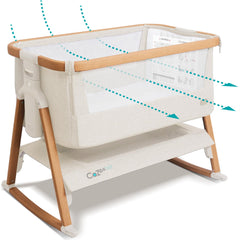 Tutti Bambini CoZee Air bassinet side view showing safe bedside setup for baby sleep