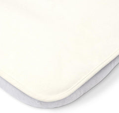 Tutti Bambini soft cotton cover bassinet protector offers gentle, cuddle-ready sleep surface.