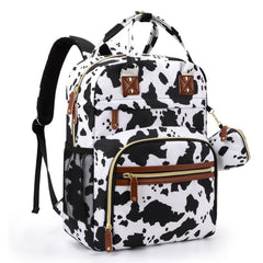 Tuwubi cow-print diaper bag backpack offers stylish storage for baby on the go.