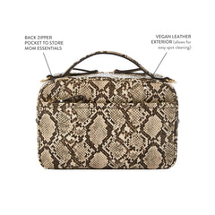 TWELVElittle Luxe Diaper Clutch detachable mesh pouch stores creams for quick access.