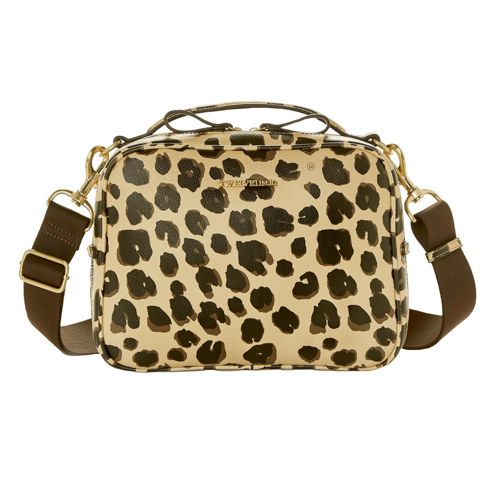 TWELVElittle Luxe Diaper Clutch leopard exterior for fashion-forward outings.