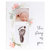 Two Little Dinos baby memory book cover display for personalized keepsakes