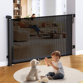 Uamector retractable gate 72-wide extends across doorways for safe passage.